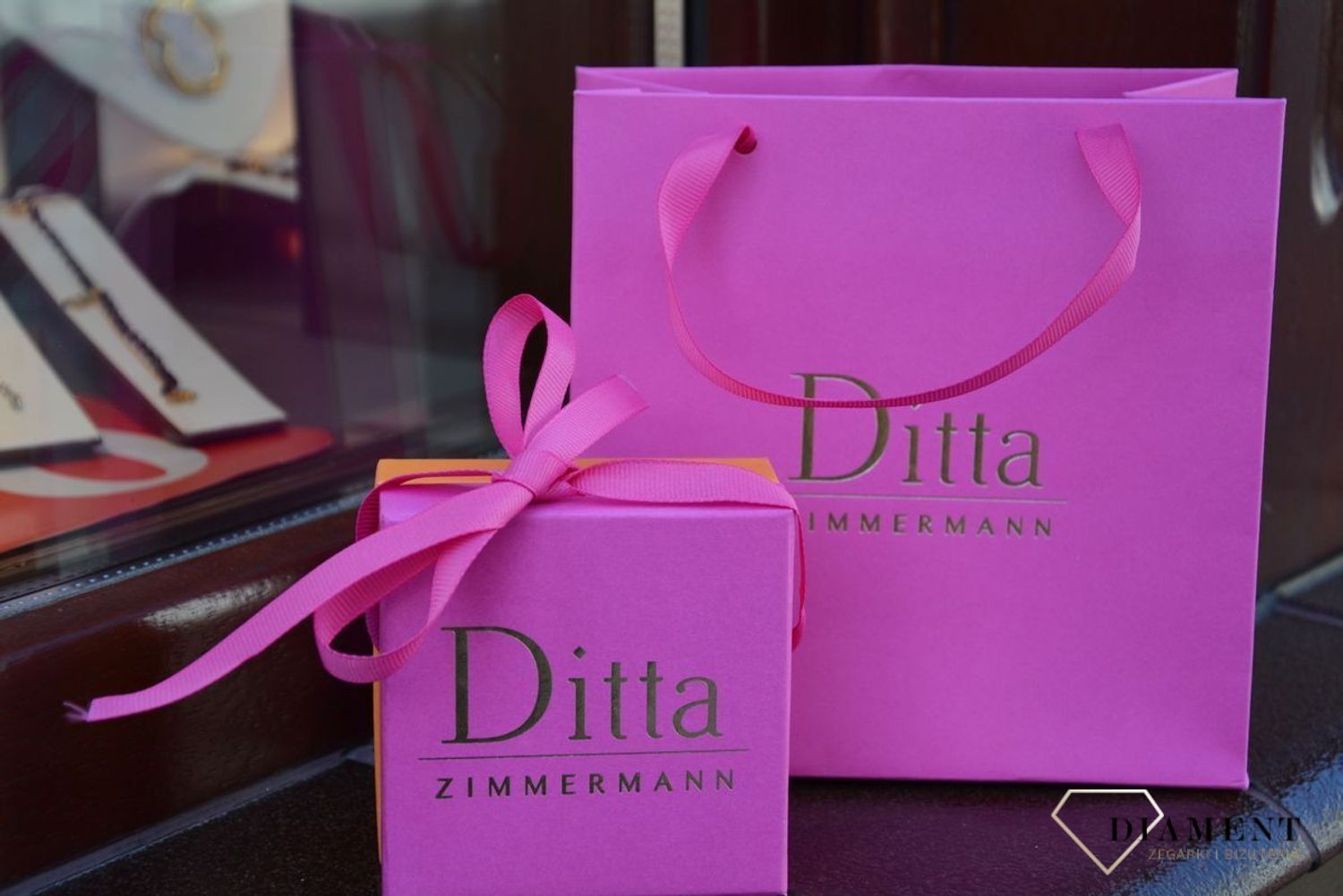 Pierścionek srebrny pozłacany z różowym kocim okiem DZP343RKOZ.jpg